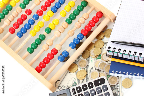 Bright wooden abacus and calculator. Conceptual photo of old