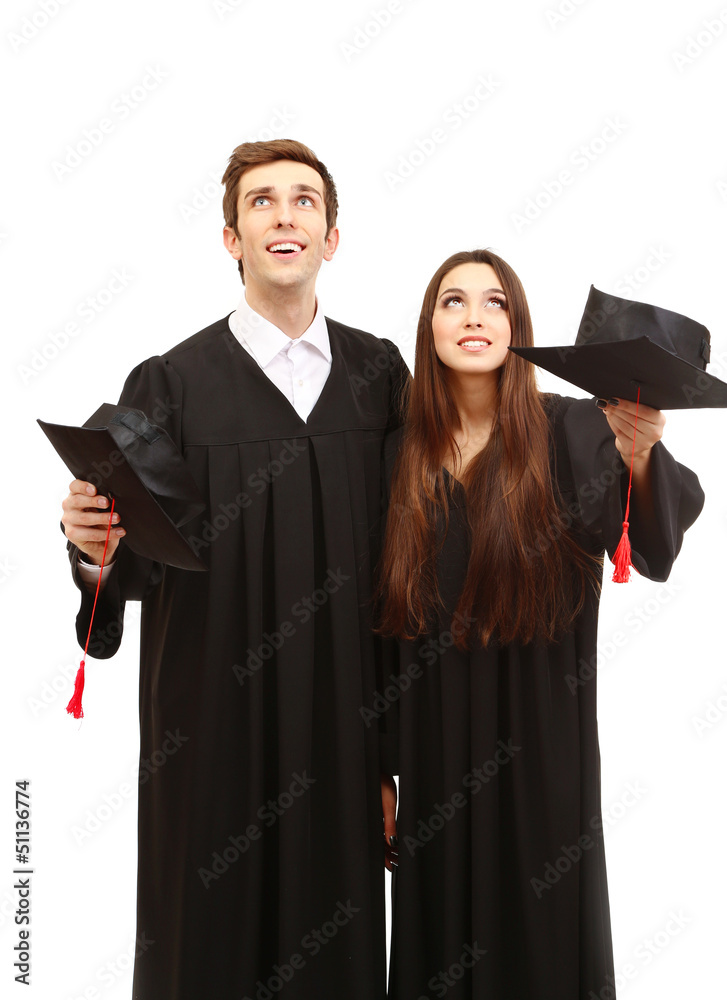 Two happy graduating students isolated on white Two happy graduating students isolated on white