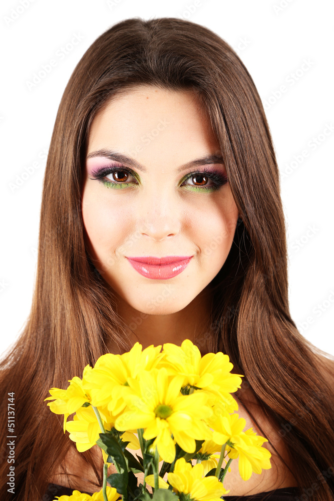 Young beautiful girl with nice flowers in her hand, isolated