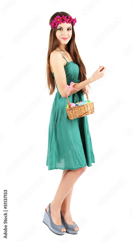 Happy female holding basket with Easter eggs, isolated on white Happy female holding basket with Easter eggs, isolated on white