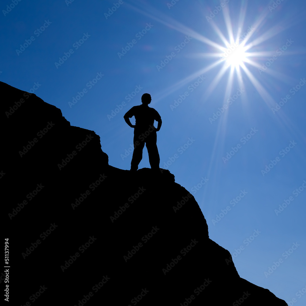 people silhouette on a blue sky background