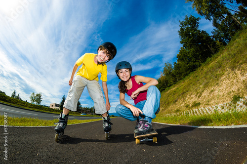 Active young people - rollerblading, skateboarding