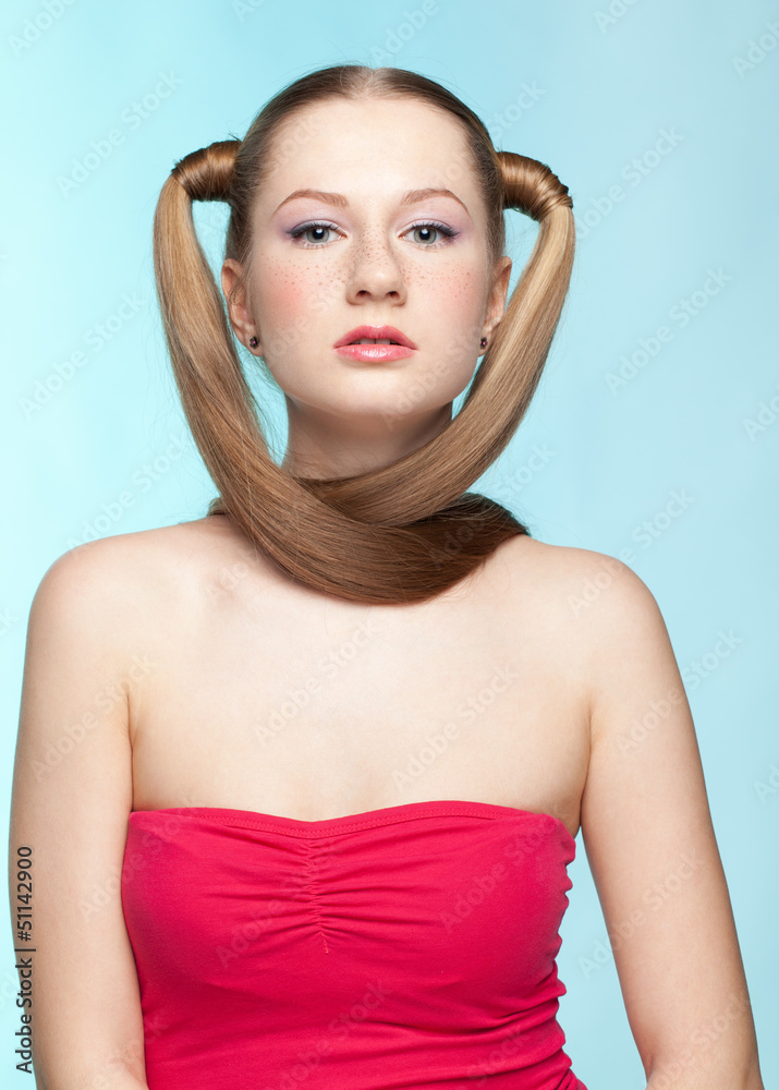 Freckled girl in red dress