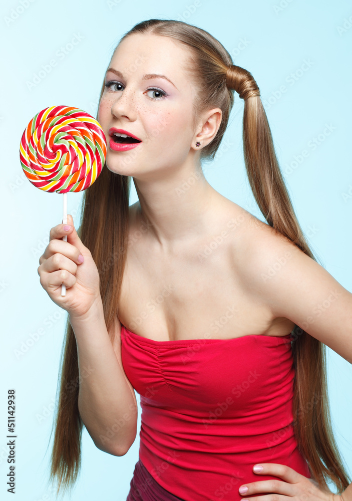 Young woman with lollipop