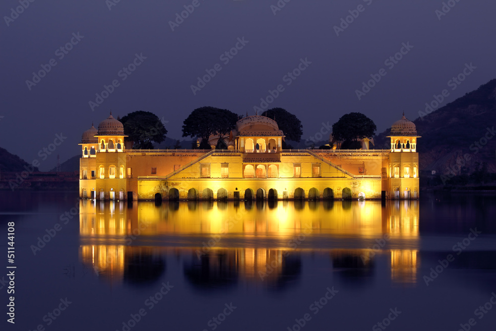 jal mahal palace on lake at night in India