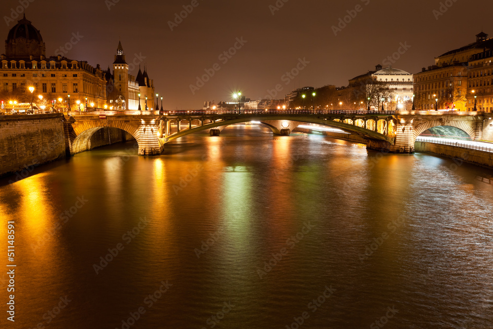 night panorama of Seine river in Paris