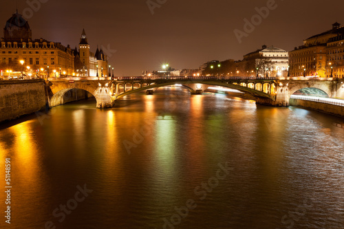 night panorama of Seine river in Paris