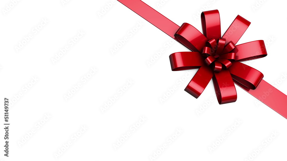 Red ribbon and bow being tied at an angle Red ribbon and bow being tied at an angle