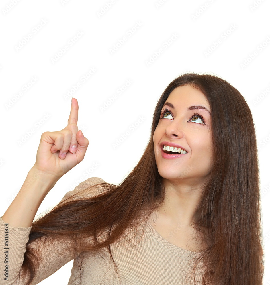 Beautiful woman showing hand on something and looking up isolate Beautiful woman showing hand on something and looking up isolate
