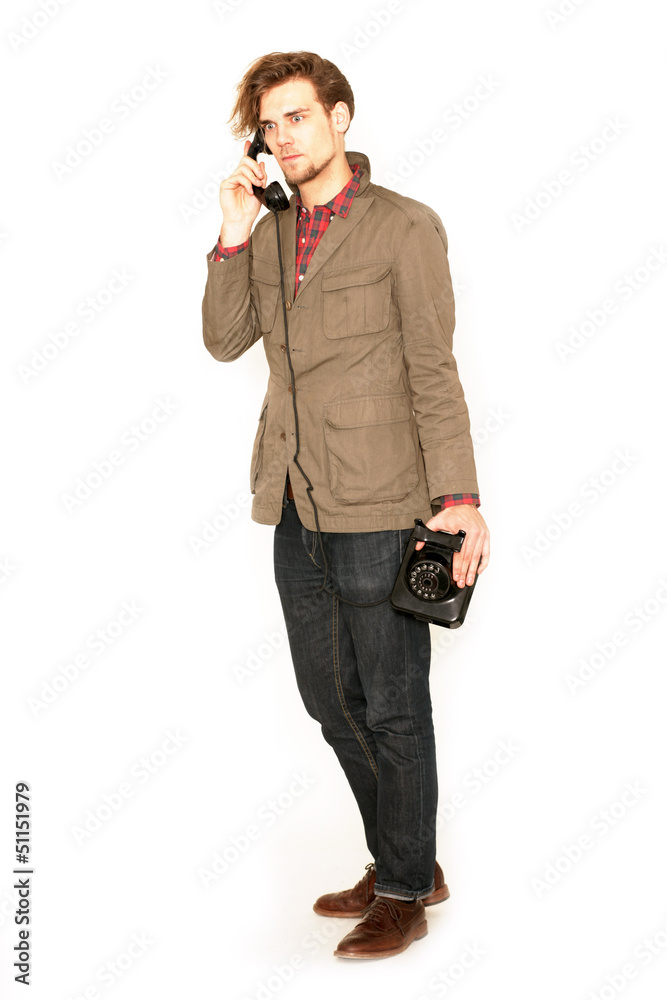 Fototapeta premium junger Mann mit Telefon