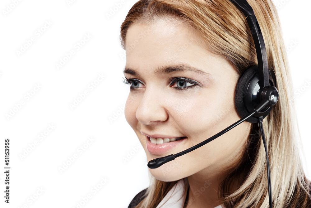 Smiling blonde woman with headphones at call center Smiling blonde woman with headphones at call center