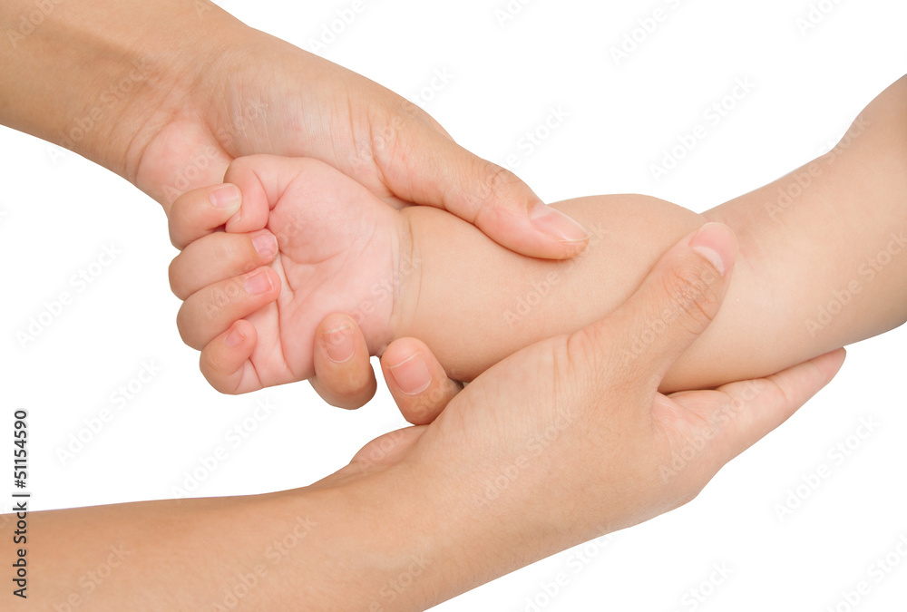 massagebaby,Mother hand massaging forearm of her baby massagebaby,Mother hand massaging forearm of her baby