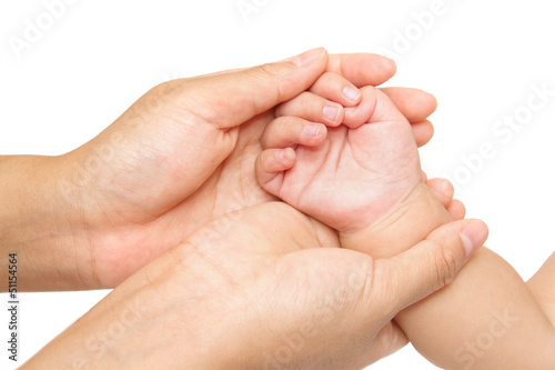baby massage,Mother hand massaging hand of her baby