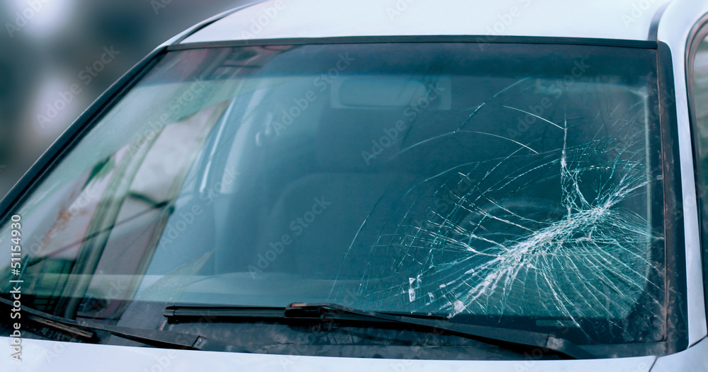 Naklejka premium Accident cars broken windshield close up background