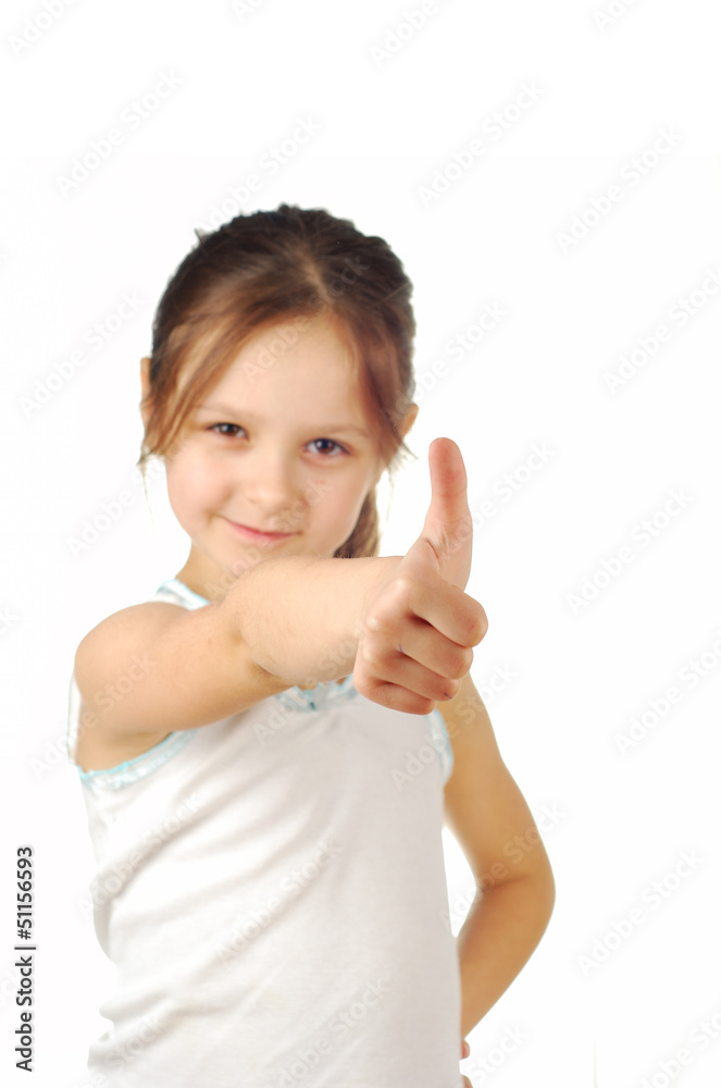 Portrait of a girl showing thumbs up isolated