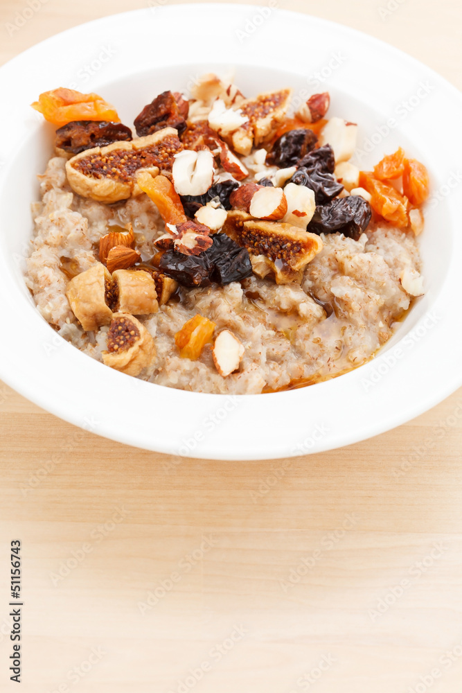 oatmeal with raisins, nuts and maple syrup oatmeal with raisins, nuts and maple syrup