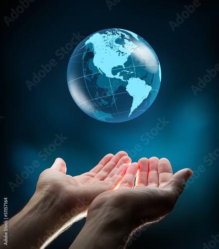 Fototapeta Naklejka Na Ścianę i Meble -  blue world in hands