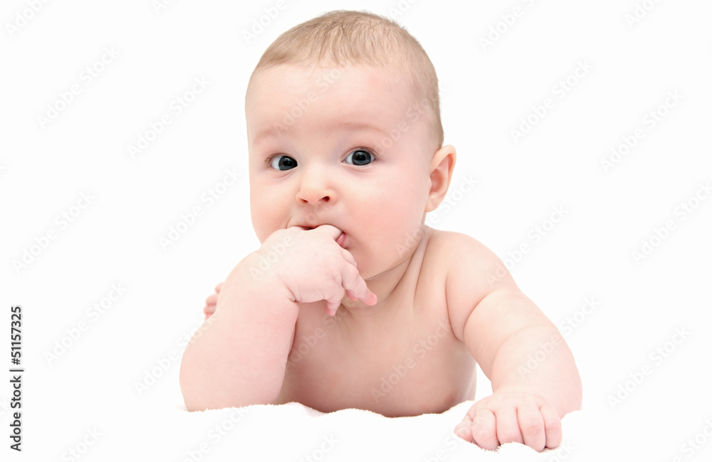 Beautiful baby lies on white blanket Beautiful baby lies on white blanket