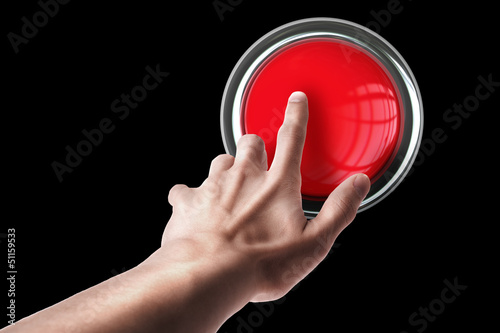 hand press on big Red button isolated on black background
