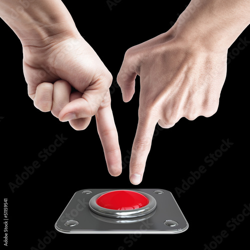 hand press on big Red button isolated on black background