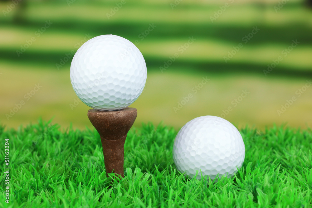 Golf balls on grass outdoor close up Golf balls on grass outdoor close up