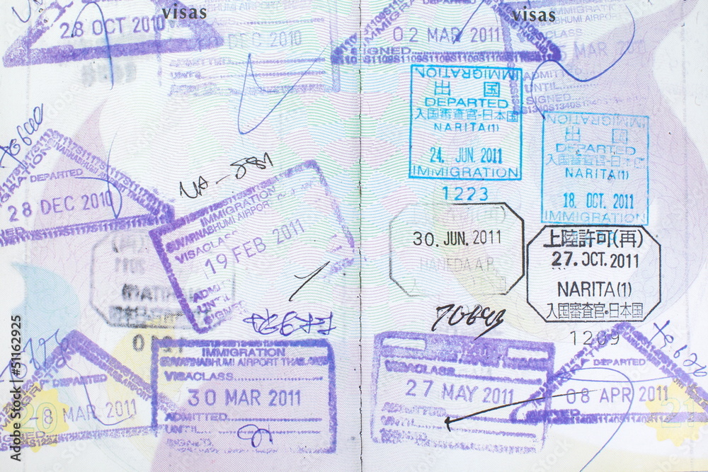 Fototapeta premium Passport stamps entering Japan, Thailand