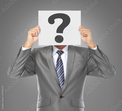 businessman with question mask photo