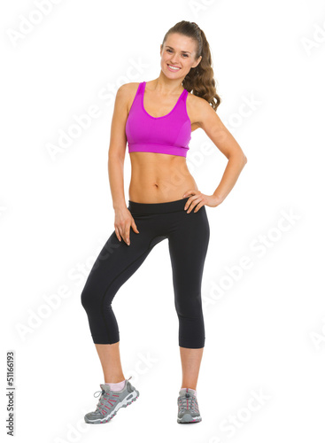 Full length portrait of smiling fitness young woman