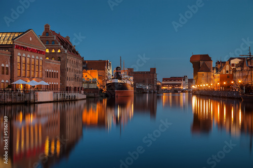 Old town with Motlawa river at night in Gdansk, Poland.