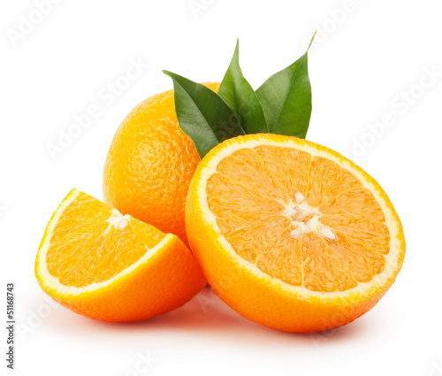 Ripe oranges with leaves
