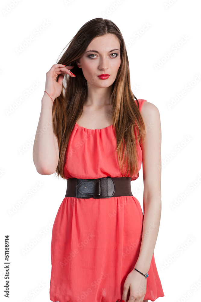 Beautiful female fashion model posing in pink dress Beautiful female fashion model posing in pink dress