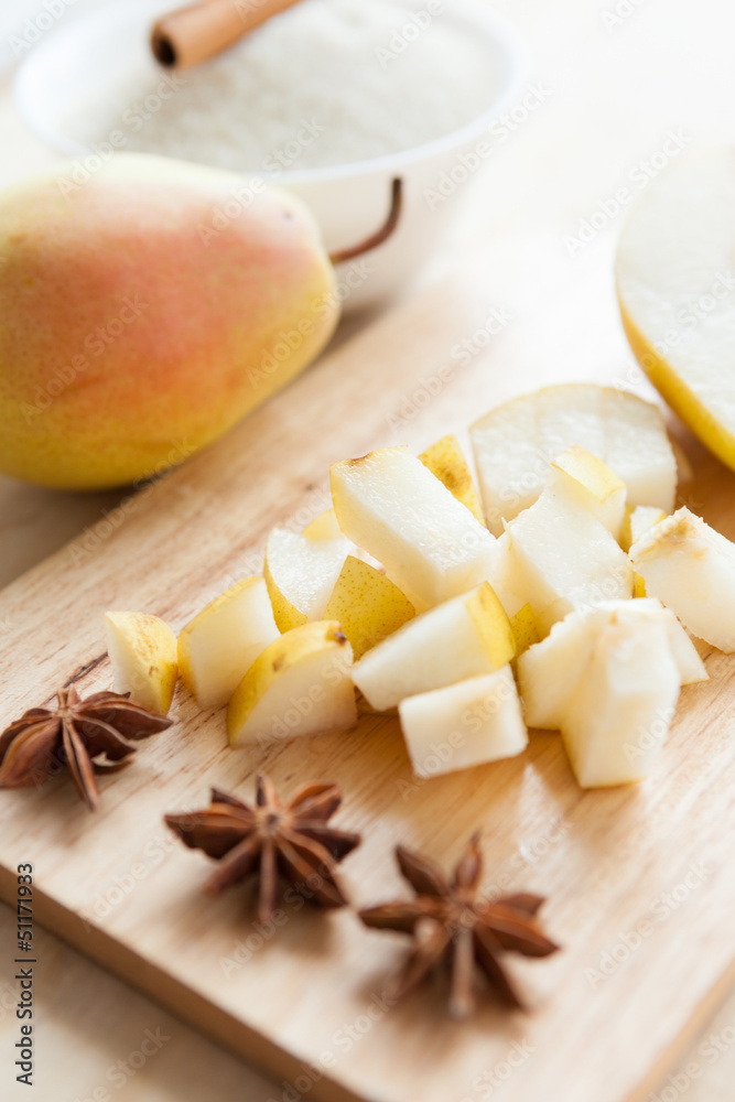 slices of ripe yellow pears on the board