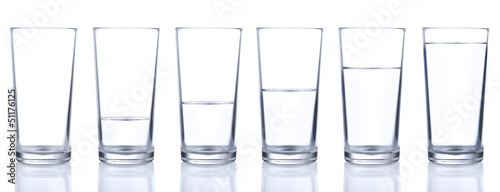Six glasses with different levels of water