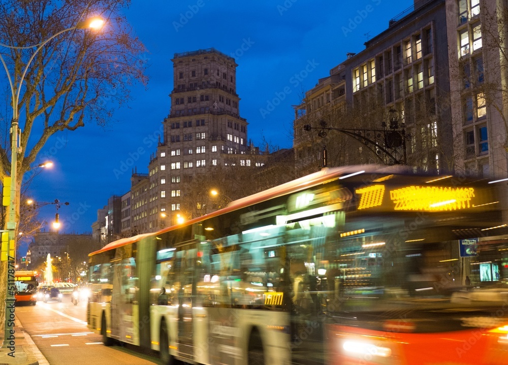 Fototapeta premium Fast moving traffic in night city