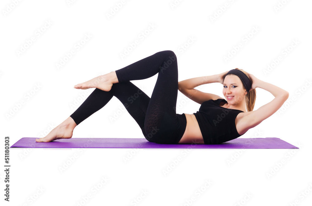 Young female doing exercises on white Young female doing exercises on white