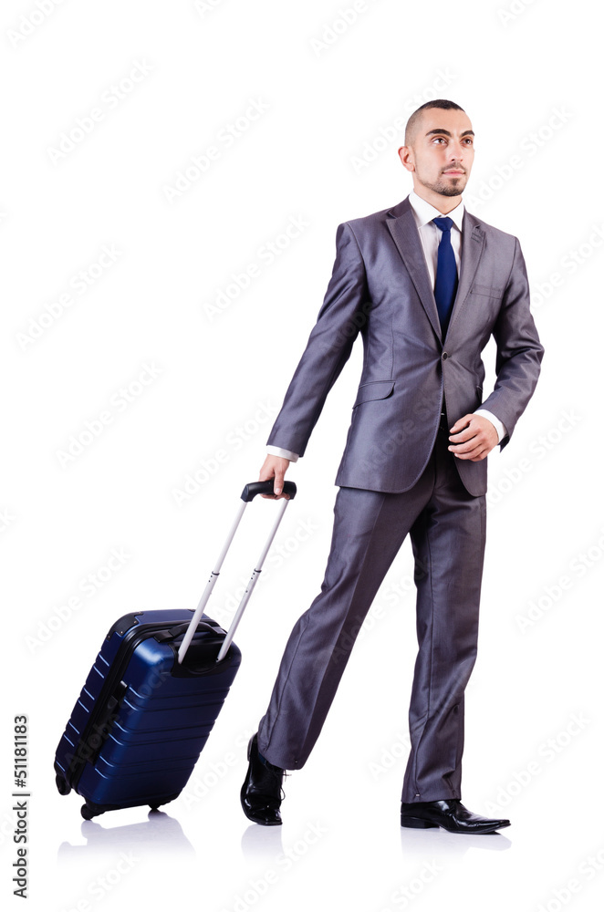 Businessman with luggage on white