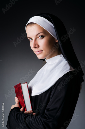 Obraz na plátně Young nun in religious concept