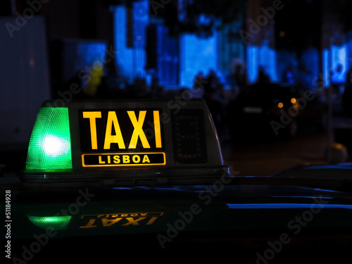 Lisboa taxi sign at night, Portugal