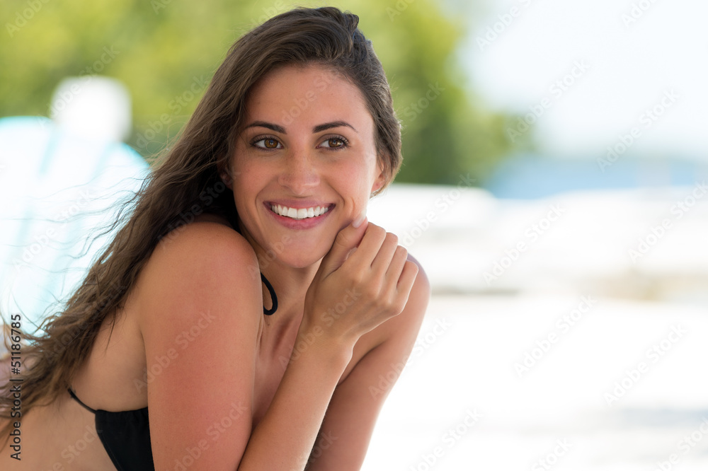 Beautiful smiling woman in a tropical beach Beautiful smiling woman in a tropical beach