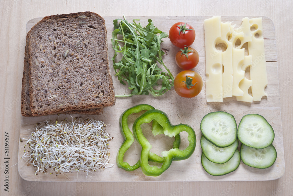 Raw food ingredinent on wooden cutting board Raw food ingredinent on wooden cutting board