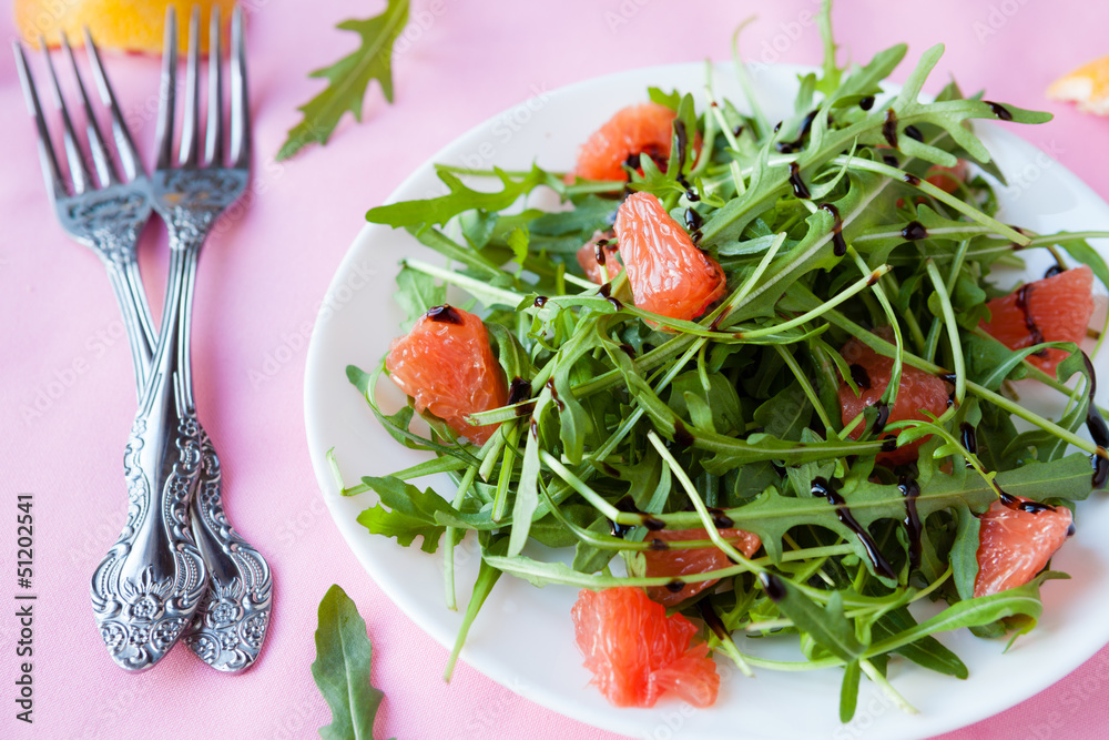 salad with arugula and grapefruit slices salad with arugula and grapefruit slices