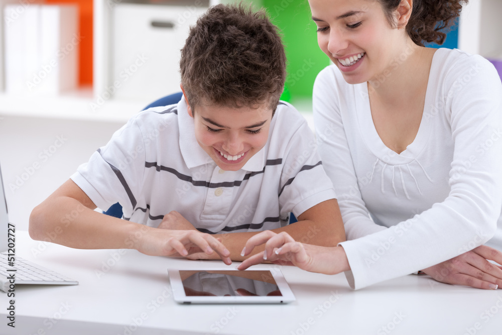 sister and brother having fun with digital tablet sister and brother having fun with digital tablet
