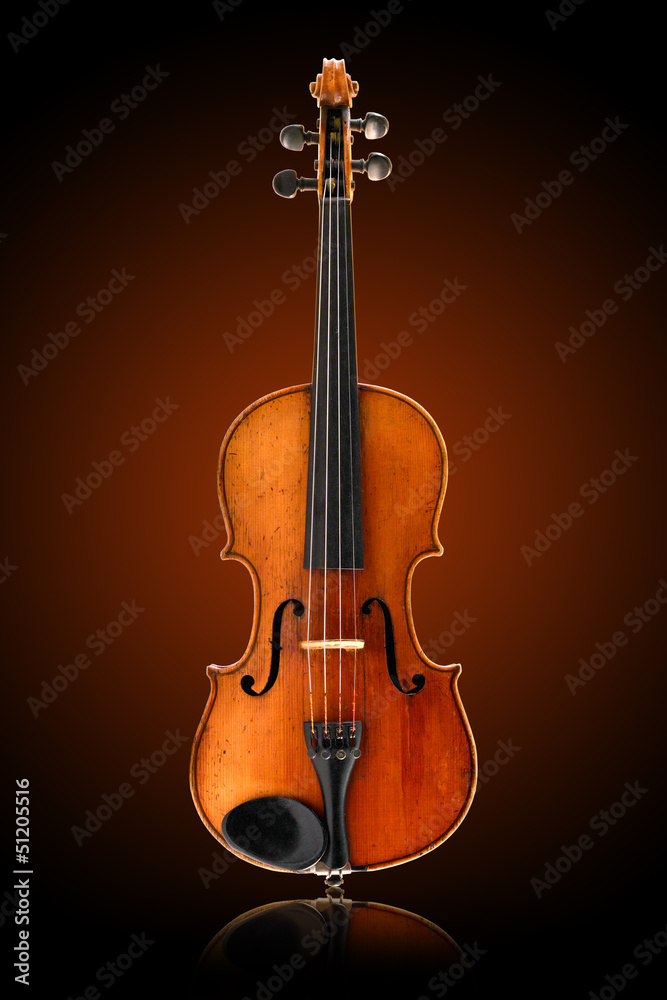 antique violin on brown background antique violin on brown background