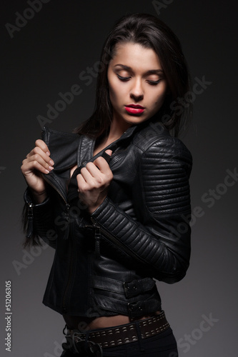 Glamorous woman in black jacket
