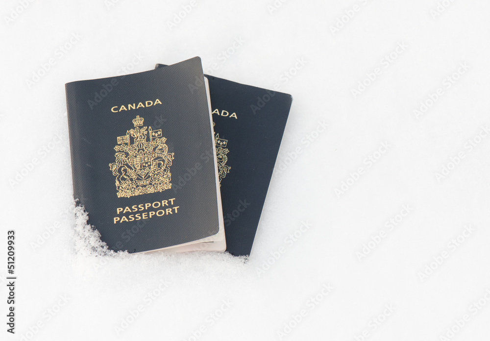 Two passports in the snow