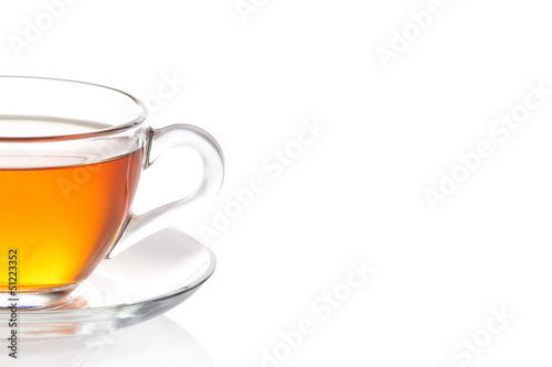 Cup of black tea with saucer
