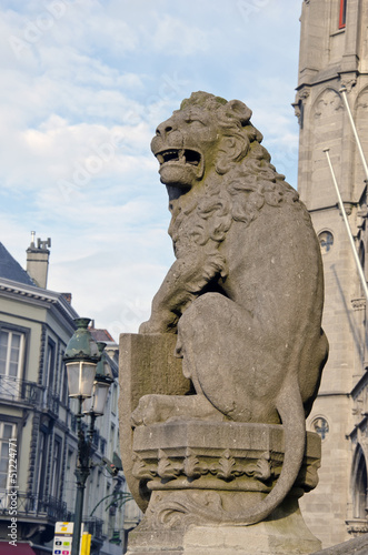 ancient lion sculpture in Brugge street