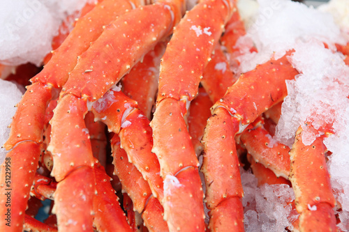 Fresh crab legs at a seafood market photo
