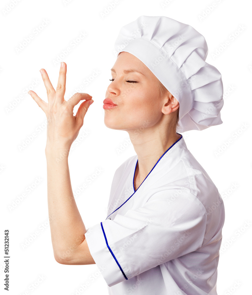Beautiful Caucasian woman cook in uniform enjoying dish Beautiful Caucasian woman cook in uniform enjoying dish