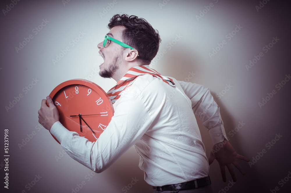 © Eugenio Marongiu - funny businessman with wall clock